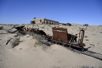 Wagon of an old narrow-gauge railway in the desert sand, Pomona, restricted diamond area, near
