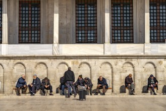 Muslims at the washbasins for the Wudu' ablution of the Fatih Mosque in Fatih, Istanbul, Turkey