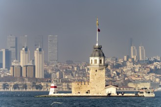The Maiden Tower lighthouse, Leander Tower or Maiden Tower in front of the skyline of Istanbul,
