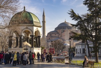 Tourists at the German Fountain or Kaiser Wilhelm Fountain and the Hagia Sophia or Church of St
