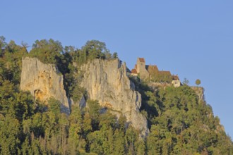 Werenwag Castle on the mountain with rock formations, cliffs, forest, landscape, light mood,