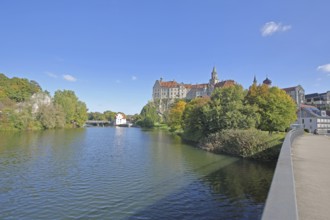 Hohenzollern Castle and Danube, bank with Panthelstein and autumn colours, landmark, castle bridge,