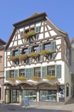 Half-timbered house with shutters, Unterer Markt, Wiesloch, Baden-Württemberg, Germany
