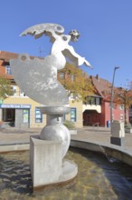 Sculpture guardian angel by Jürgen Goertz, modern art, water basin, fountain, shiny angel with