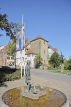 Gänselieselbrunnen by Helmut Waldherr 1981 and local history museum with historical fortified