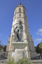 Market fountain with medieval knight figure, Württemberg coat of arms shield with sword, bronze