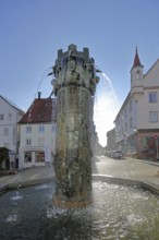 Town hall fountain with reliefs and figures by Klaus Ringwald 1998, bronze sculptures, water