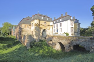 Large castle built in the 18th century, stone arch bridge, Kleinbüllesheim, Euskirchen,