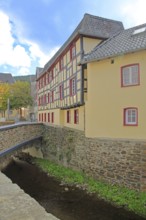 Bridge over the Erft stream and half-timbered house, Fibergasse, Bad Münstereifel, Ahrgebirge,