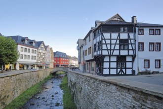 Erft stream with stone arch bridge and half-timbered houses, Delle, Bad Münstereifel, Ahrgebirge,