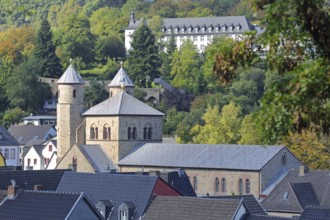 Romanesque collegiate church of St. Chrysanthus and Daria, townscape, historic town wall, twin