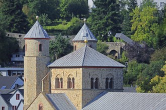 Twin towers of the Romanesque collegiate church of St Chrysanthus and Daria and historic town wall,