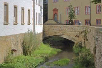 Brewery with stone arch bridge for the Erft and St Michael's Grammar School, market, Bad