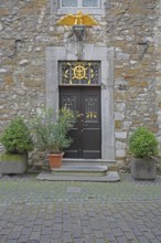 Front door with golden eagle figure to Kupferhof Schleicher, decoration, Burggasse, Rhineland,