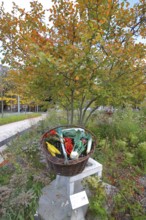 Sculpture market basket with chair by Thomas Schmidt, modern art, metal design, metalworking, steel