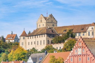 Historic castle on an autumnal hill in front of a blue sky, Meersburg, Lake Constance, Germany