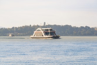 Ferry at sea, wooded horizon, quiet atmosphere, Meersburg, Lake Constance, Germany