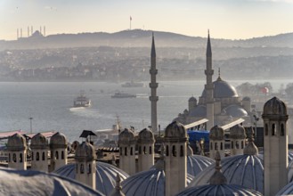 View over the roofs of the Süleymaniye Mosque to the New Mosque Yeni Cami and the Bosporus,