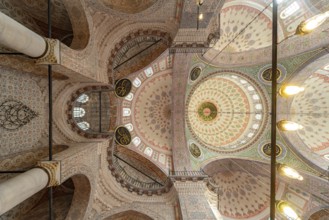 Interior and domes of the New Mosque Yeni Camii in Istanbul, Turkey