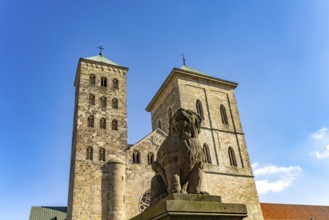 Lion poodle figure in front of St Peter's Cathedral in Osnabrück, Lower Saxony, Germany