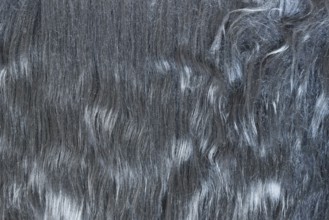 Close up of dark gray synthetic fake fur