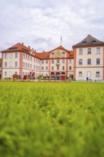 Historic castle with manicured lawn in the foreground, Mainau flower island, Lake Constance,