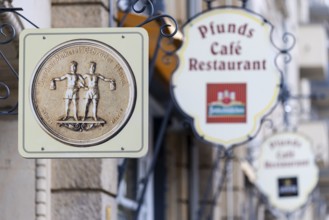 Façade signs on the Pfunds dairy, Neustadt, Dresden, Saxony, Germany