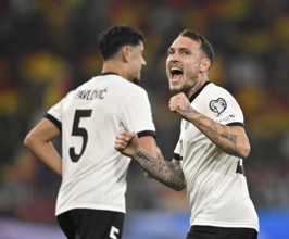 Goal celebration David Raum GER (22) Gesture Gesture Aleksandar Pavlovic GER (05) World Cup