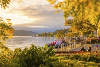 Picturesque lakeside promenade at sunset with a view over the tranquil lake, Überlingen, Lake