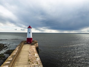 Berwick Pier and Lighthouse from a drone, Berwick-upon-Tweed, England, United Kingdom