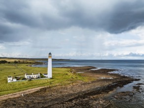 Rain Clouds over Barns Ness Lighthouse from a drone, Dunbar, East Lothian, Scotland, UK