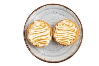 French lemon tart with meringue isolated on white background, top view, flat lay, close up