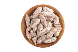 Small smoked Chicken sausages in wooden bowl isolated on white background. top view, close up