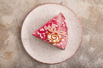 Chocolate cake on brown concrete background, top view, flat lay, close up