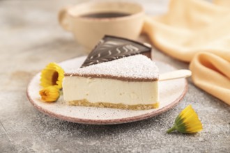 Chocolate and Vanilla Cake pops Marshmallow with cup of coffee on brown concrete background and