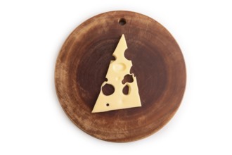 Piece of cheese with holes on cutting board isolated on white background, top view, flat lay, copy