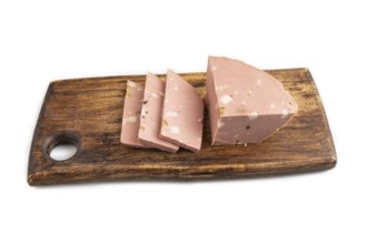 Mortadella sausage on wooden cutting board with pepper and herbs isolated on white background. Side