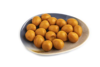 Pile of Smoked Quail eggs isolated on white background. side view, close up