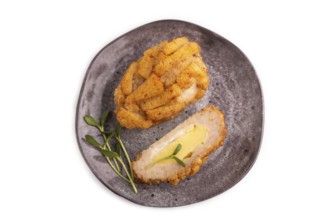 Chicken Schnitzel on gray plate with microgreen Isolated on white background. top view, flat lay,