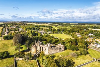 Ruins of Dirleton Castle & Gardens from a drone, Dirleton, East Lothian, Scotland, UK