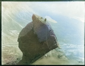 Climber with rope climbing The Cioch, The Cuillins, Isle of Skye, Scotland, UK c 1910-1920