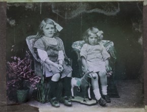 Paget process colourised magic lantern slide family portrait of two young girls presumably sisters