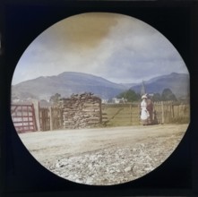 Woman Victorian or Edwardian tourist with background of Ambleside, Lake District, Cumbria, England,