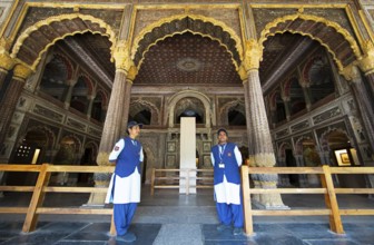 Indian woman guarding the Daria Daulat Bagh or Tipu Sultan's summer palace, Srirangapatna,