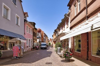 Ettlingen, Germany - August 13th 2025: City street in Ettlingen city center with boutiques and