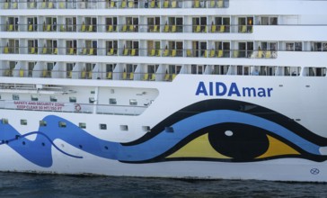 Close-up, cruise ship AIDAmar with striking blue and yellow livery, Warnemünde, Rostock,