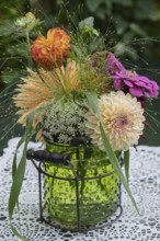 Small bouquet with dahlias, zinnias and grasses, North Rhine-Westphalia, Germany