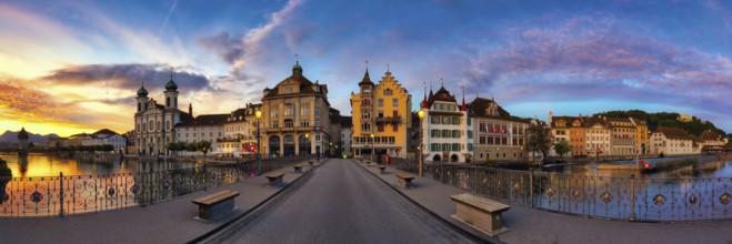Panorama from the Reuss Bridge to Lucerne's Old Town with Jesuit Church at dawn, Canton of Lucerne,