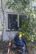 Civil defence exercise scenario, after a drone attack on a residential area, emergency services