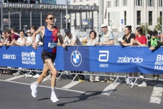Erik Hille (GER), later in 21st place, at KM38 in front of Potsdamer Platz at the 51st BMW Berlin